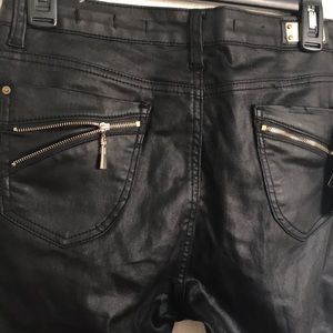 Black faux leather skinny jeans